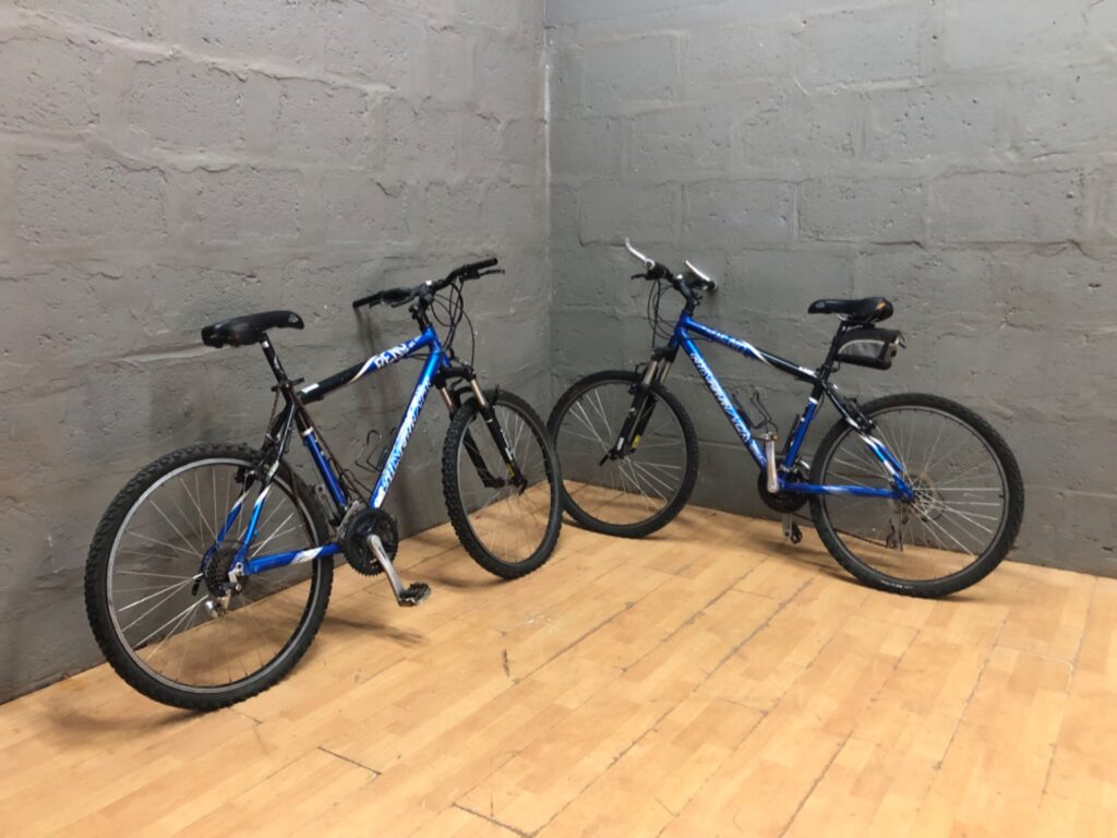 Lot of 2 Silverback ‘Reno’ blue mountain bikes – front suspension, multi-speed, used / for repair
