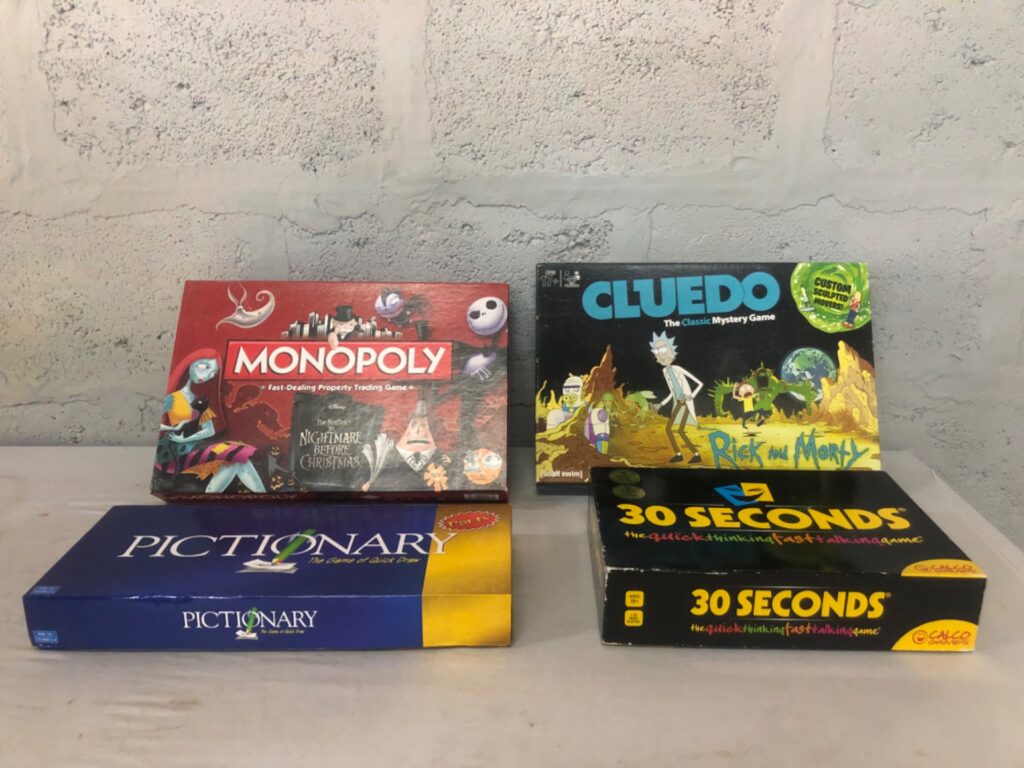 Lot of 4 Family Board Games — Monopoly (Nightmare Before Christmas), Cluedo (Rick & Morty), Pictionary, 30 Seconds
