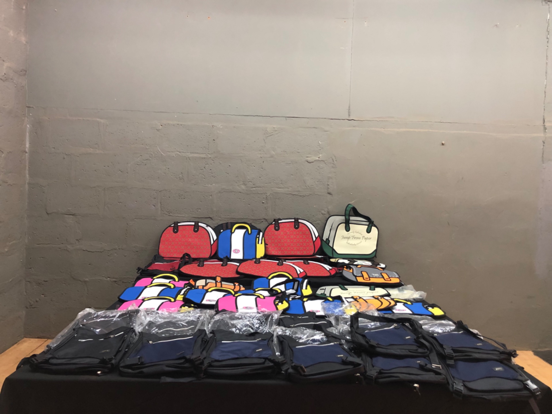 Mixed lot — colourful 2D ‘comic’ novelty totes + navy/black crossbody shoulder bags (brand new; some ‘Jump From Paper’ visible)