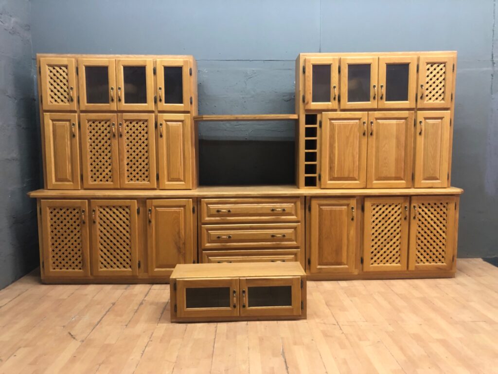 Large modular oak kitchen dresser / wall unit — 6-piece with glass doors, wine slots & drawers (used)