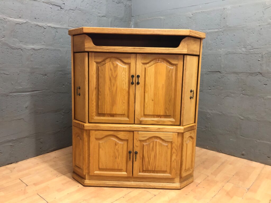 Solid oak corner TV / media cabinet with sliding CD/DVD racks — 146 x 64 x 128 cm