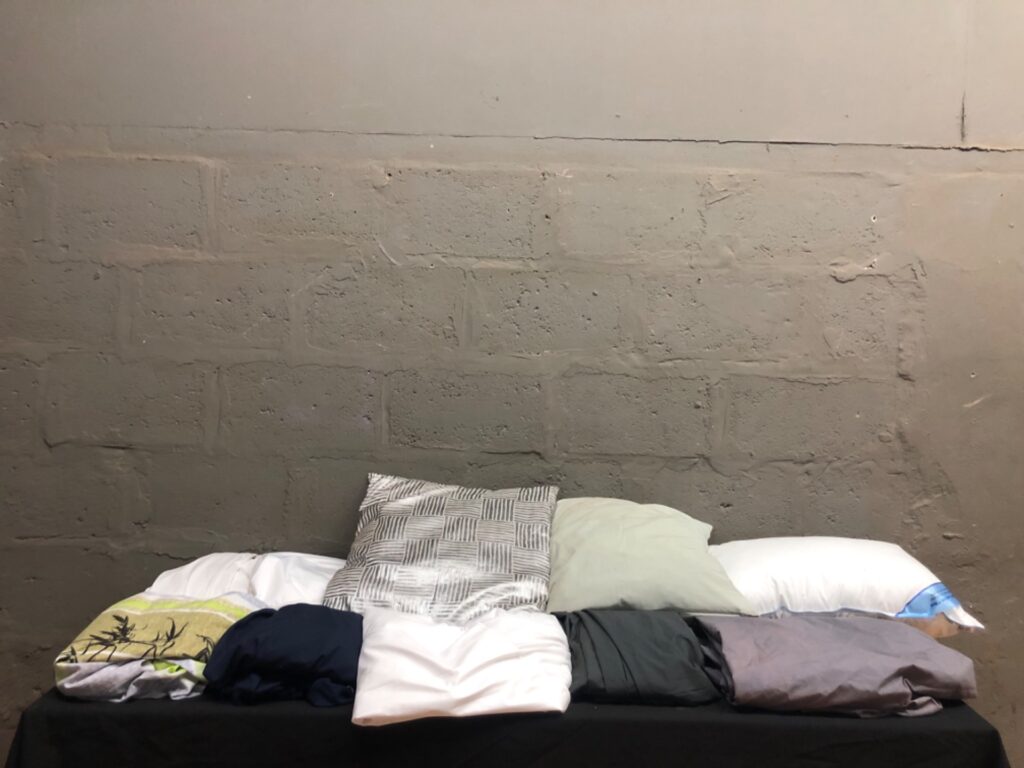 Mixed lot — 9 Bedding Items: Pillows & Pillowcases (includes Sealy Natural Comfort pillow) — Laundered, Good used condition