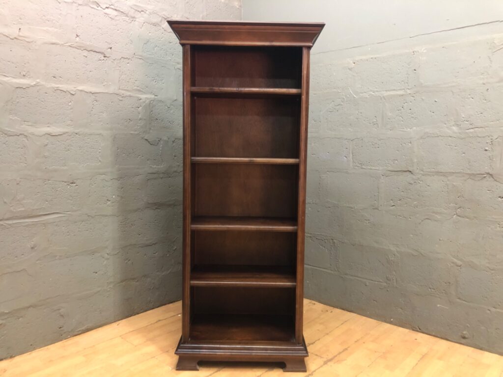Tall narrow wooden bookcase with crown moulding, adjustable shelves (189 × 46 × 82 cm)