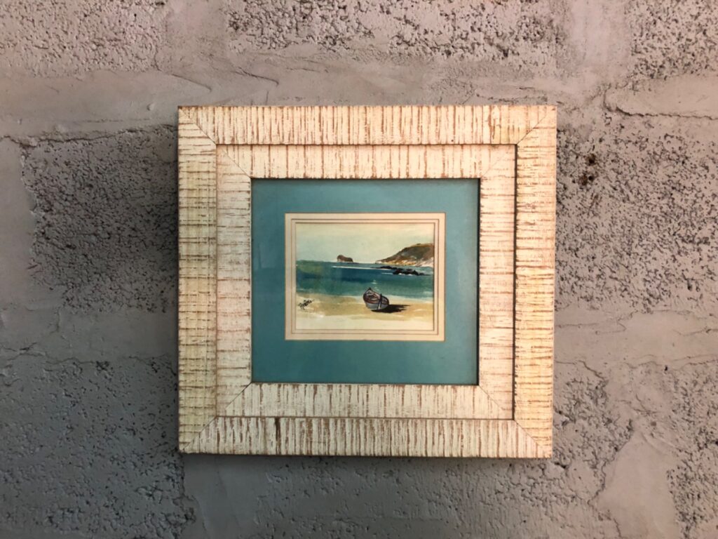 Framed signed seascape (signed ‘Aneng’) — distressed white wood frame, 40 x 38 cm