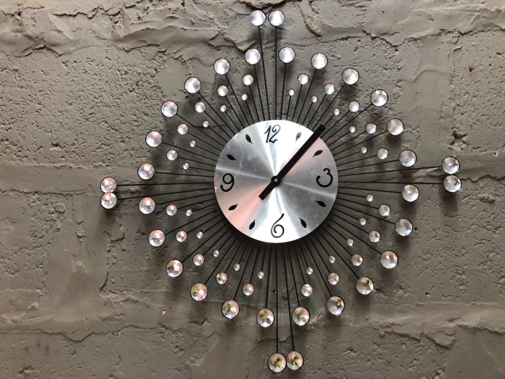 Sunburst wall clock with crystal discs — decorative 64 cm, tested working