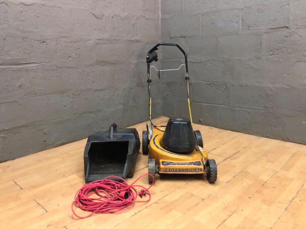 Professional corded electric lawn mower (labelled 230V 3.0kW) — not working — grass collector & extension lead included