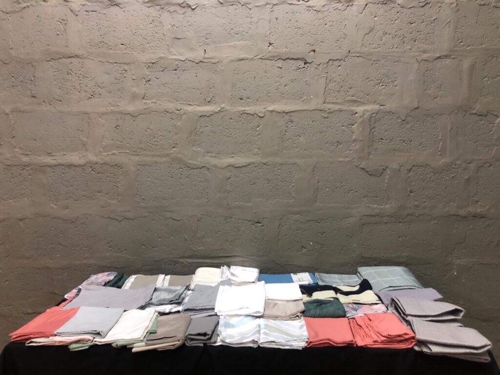 Lot of 33 Mixed Pillowcases & Household Linens — assorted colours, one boxed Sheet Street 65x65cm