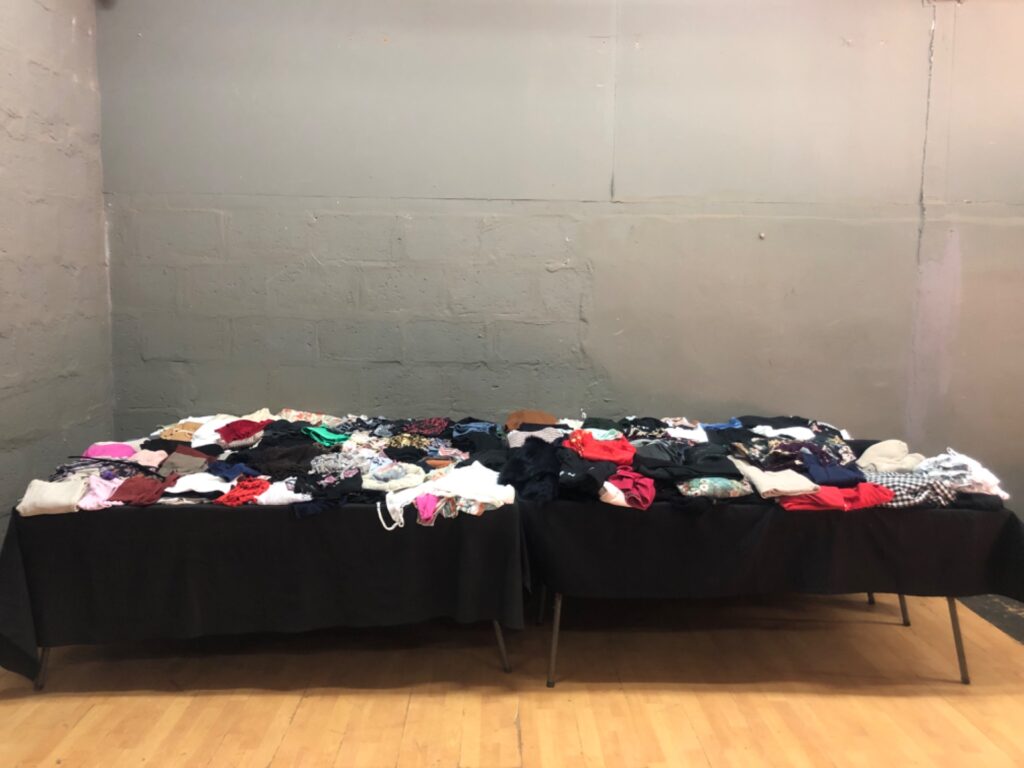 Bulk lot of women’s second‑hand clothing — assorted tops, skirts, dresses & knitwear (mixed sizes, used)