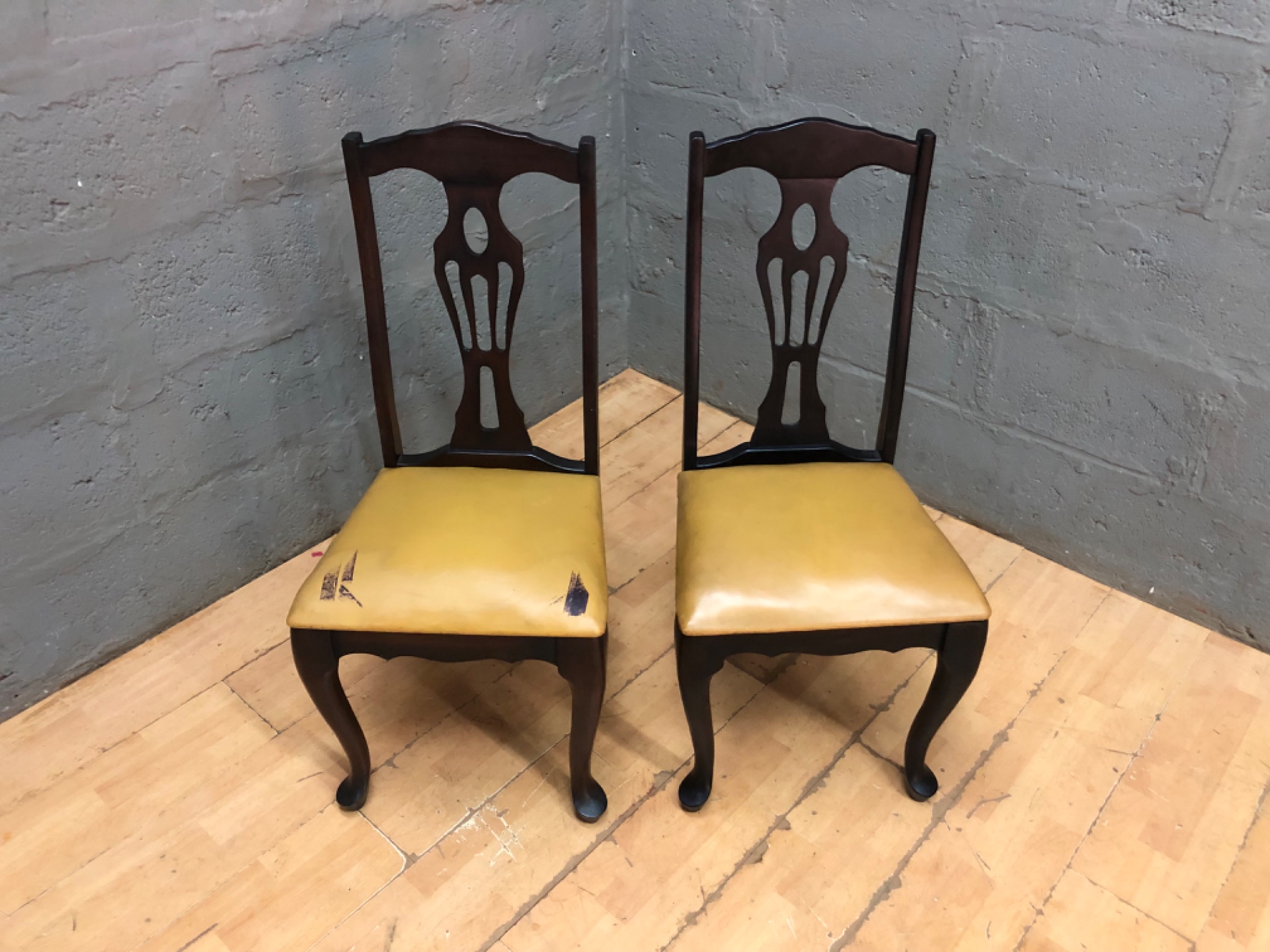 Pair of Wooden Dining Chairs — Carved Back Slats, Yellow Vinyl Seats, Solid Frames