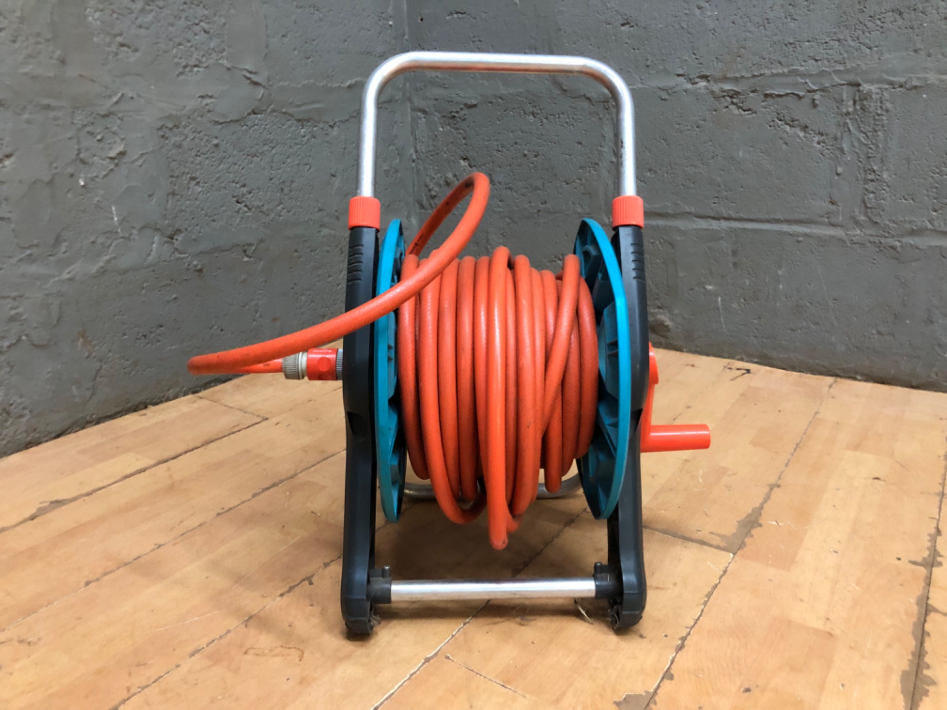 Gardena hand-crank garden hose reel with orange 13 mm (1/2″) hose — tested, working