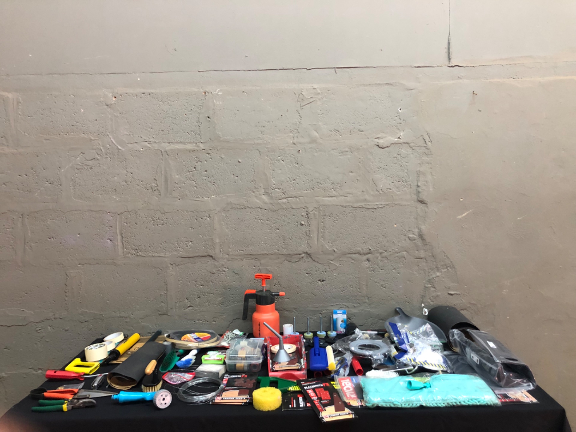 Assorted small hand tools & DIY accessories bulk lot — mixed new & used (sanding sheets, brushes, rollers, tape, fittings)