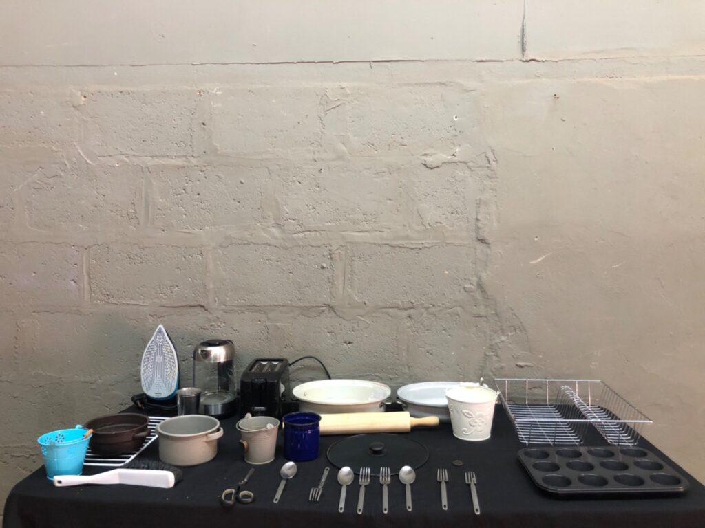 Mixed kitchenware & small appliances lot — Creative Housewares 2-slice toaster, glass kettle, Philips iron HD9339 + cookware & cutlery (approx. 23 items)