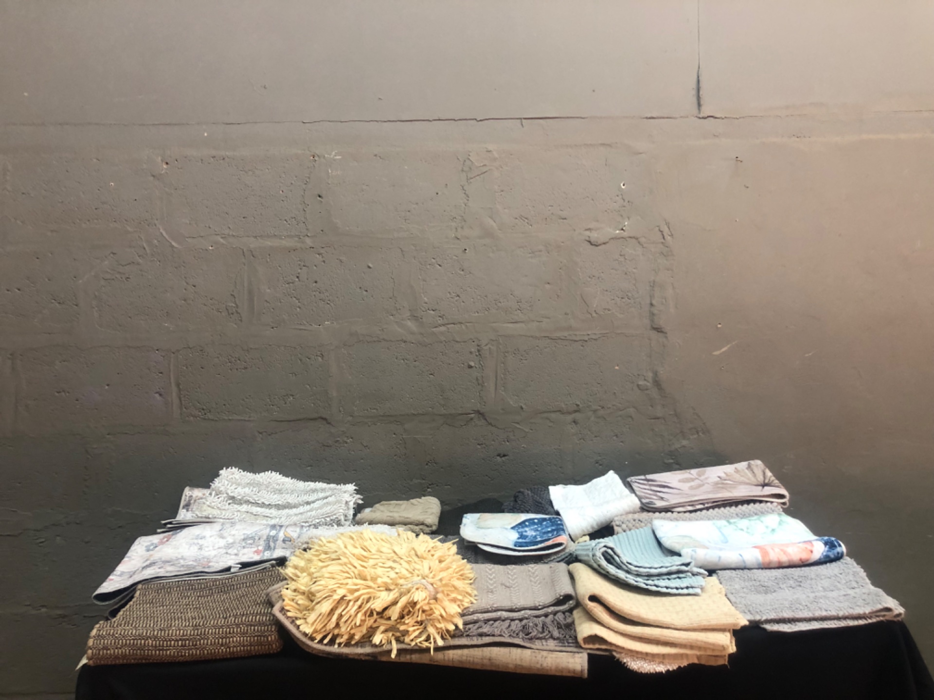 Assorted lot of bath mats, small rugs and towels — 20 pieces, used, sold as one lot
