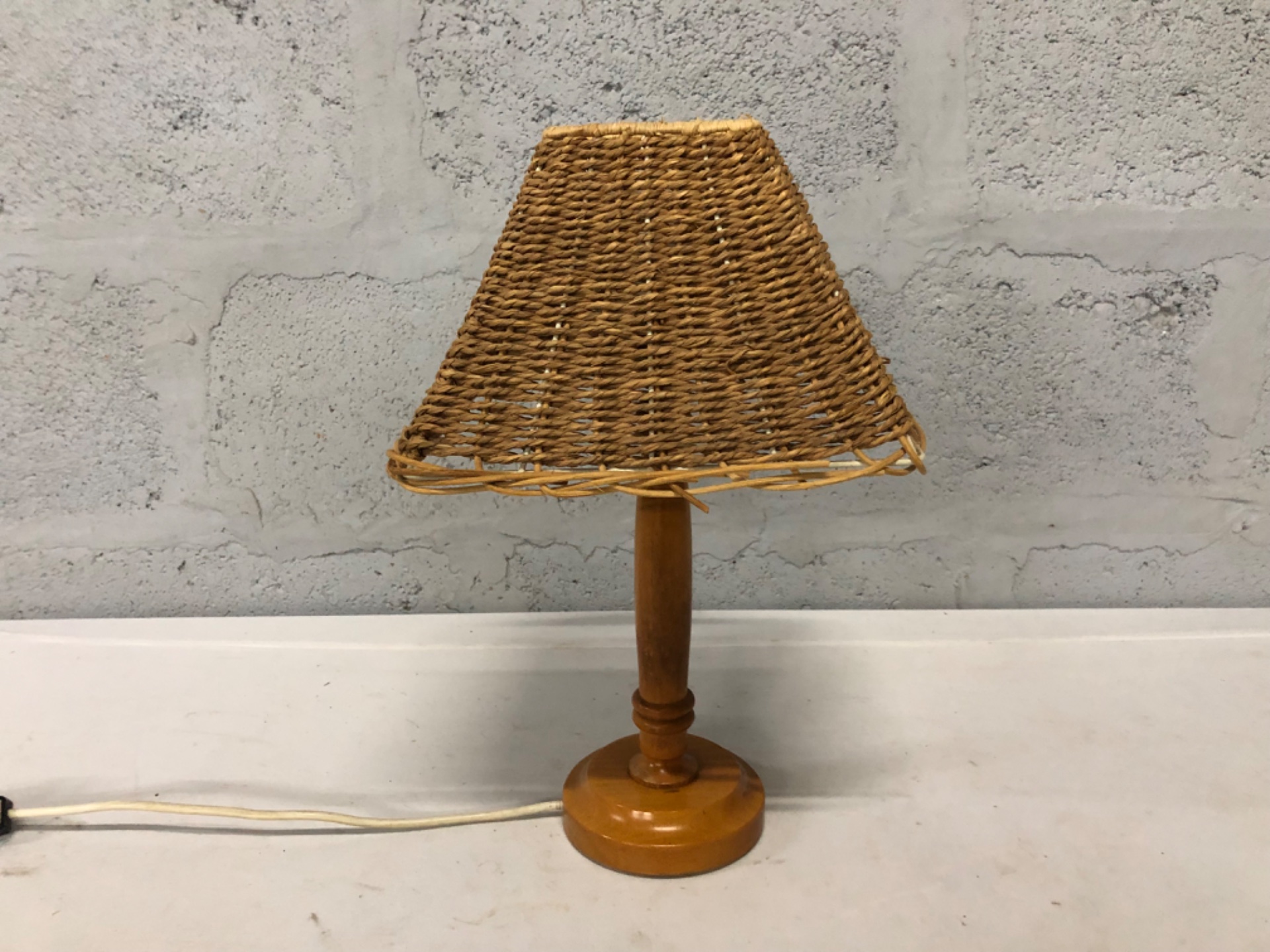 Small wooden table lamp with woven rattan shade – frayed shade, cable damage (not working)