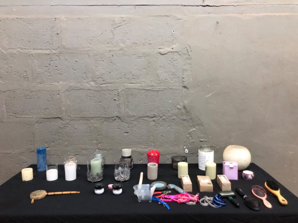 Mixed lot: Assorted candles, holders, pet leashes & grooming brushes — 37 items (used / boxed pieces)