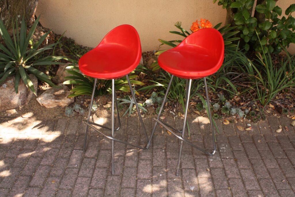 Pair of MIDJ red plastic bar stools (Made in Italy) — vintage shell seats, chrome legs