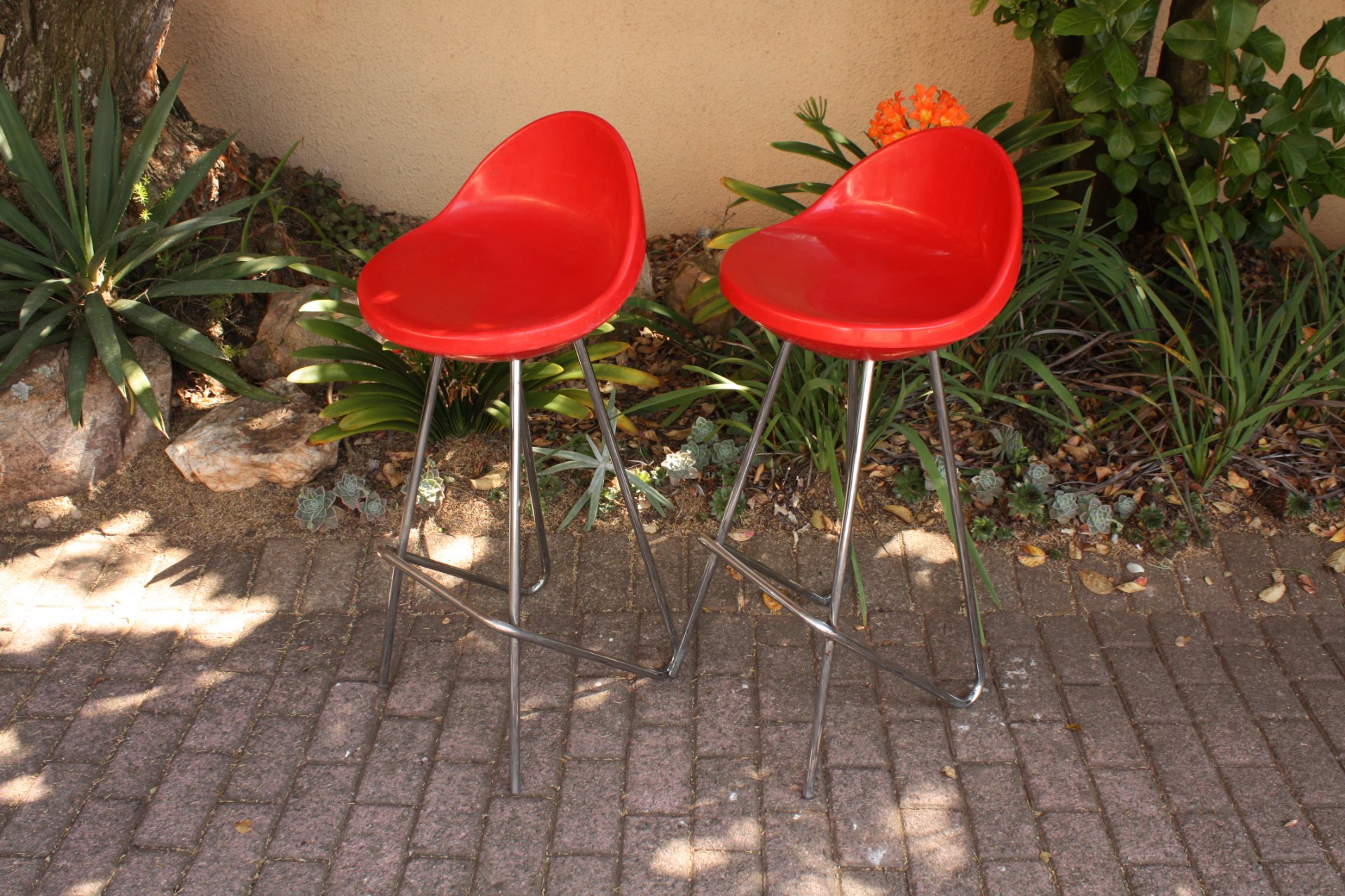 Pair of MIDJ red plastic bar stools (Made in Italy) — vintage shell seats, chrome legs