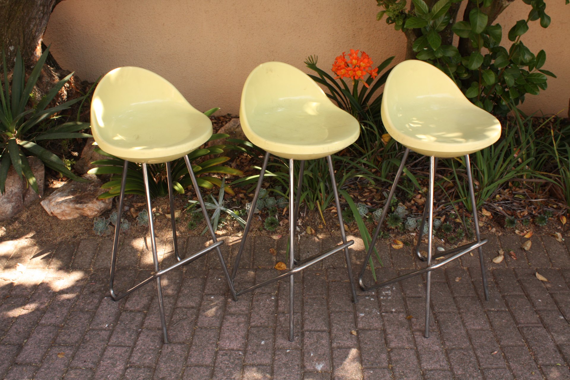 Set of 3 MIDJ / MDJ yellow plastic shell bar stools — Italian-made shells, chrome sled bases (used)