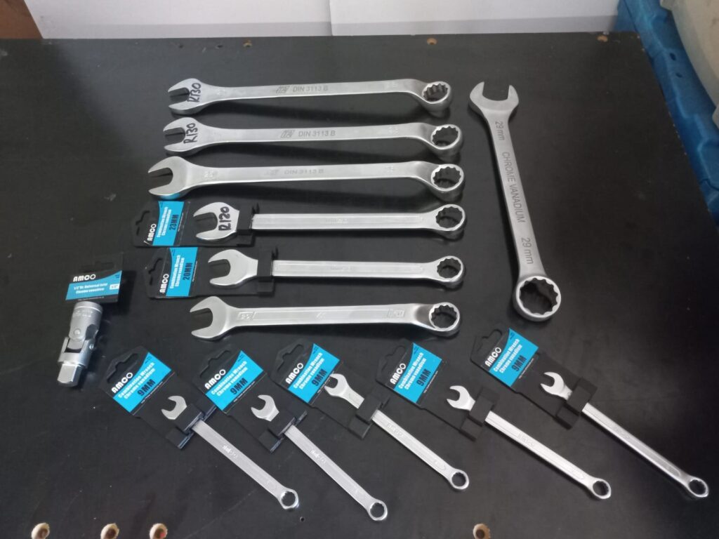 Lot of 13 Metric Combination Spanners & 1/2″ Universal Joint — AMCO-marked pieces, like-new