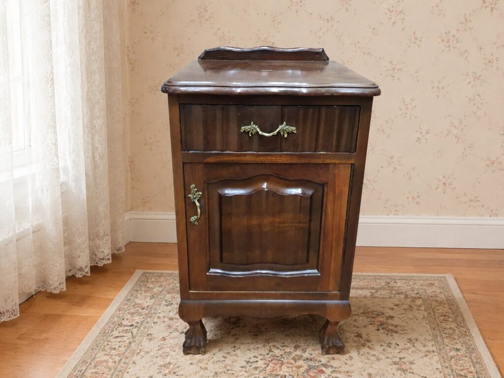 Wooden bedside cabinet / nightstand with drawer and cupboard on claw feet