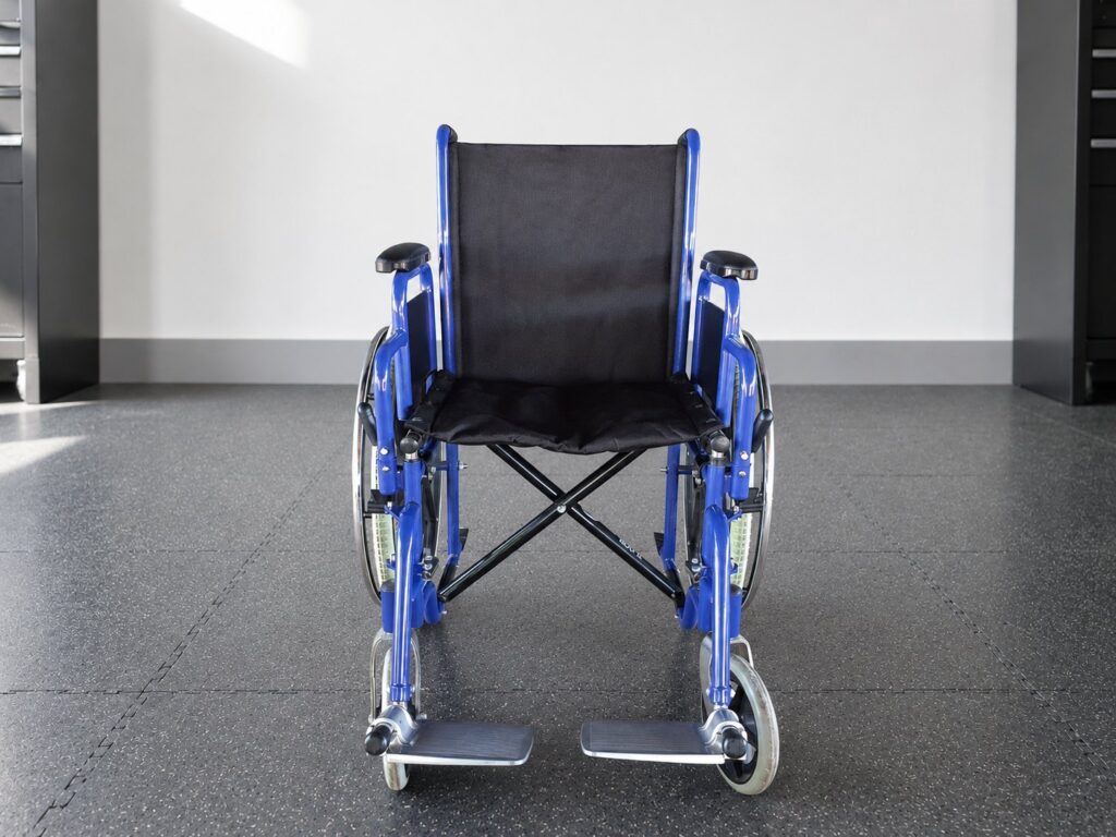 Saturn-branded blue transit manual wheelchair – foldable, footrests, light cosmetic wear