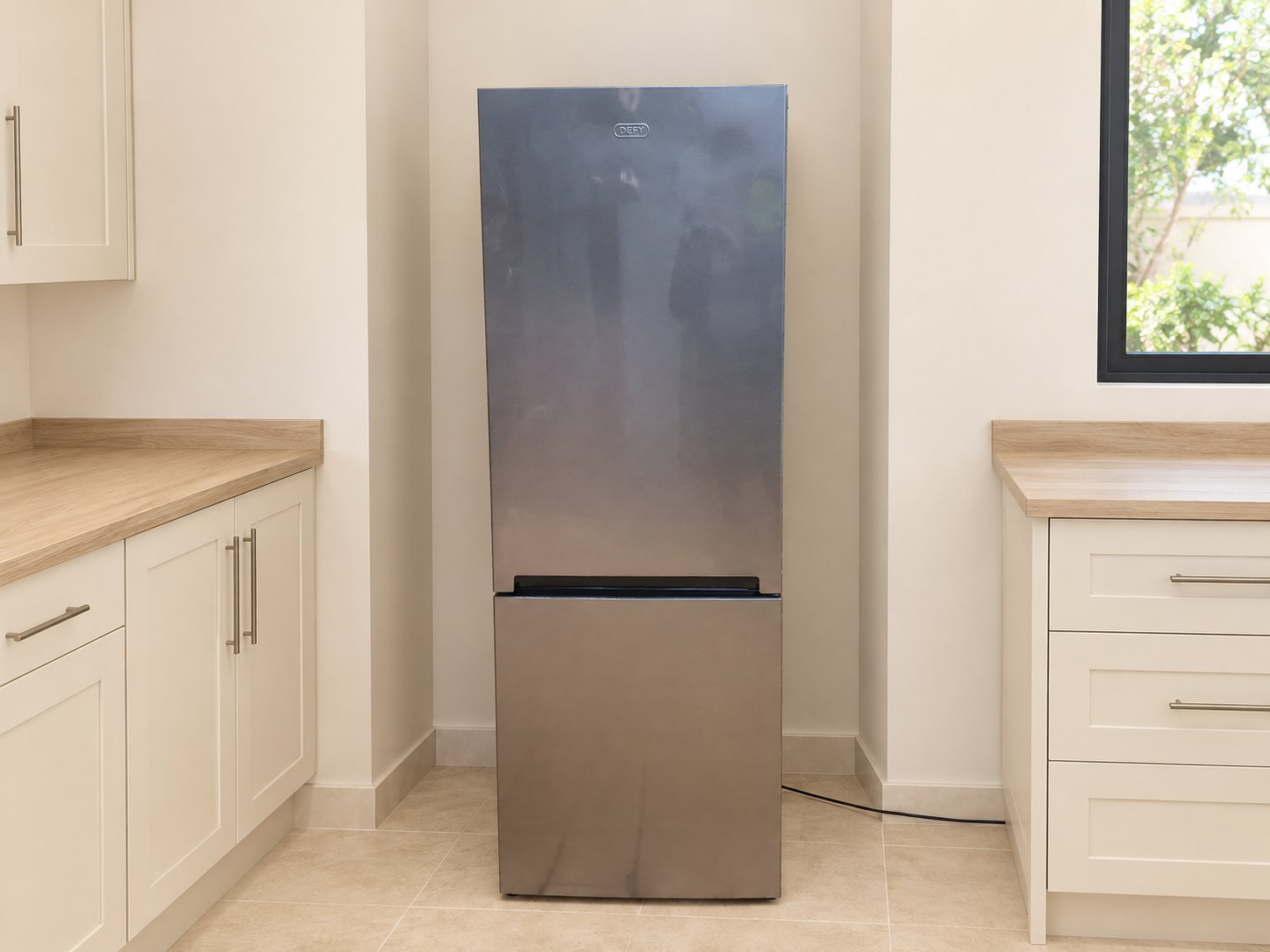 DEFY stainless-steel freestanding fridge-freezer (bottom freezer) — tested working, glass shelves & crisper