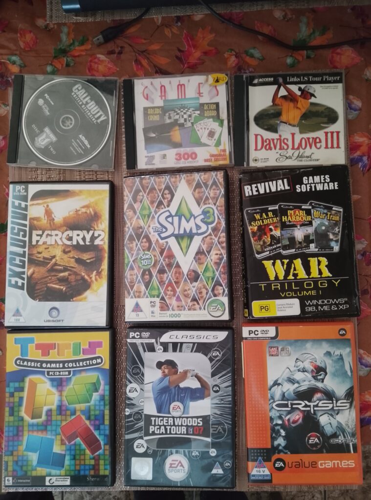 Mixed PC Game Lot – 9 titles (Far Cry 2, The Sims 3, Crysis, Tiger Woods PGA Tour 07, War Trilogy and more)