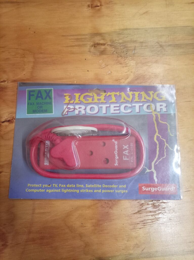 SurgeGuard SurgeTek FAX Lightning Protector (P/N C10120) – Factory sealed, packaging shelf-wear