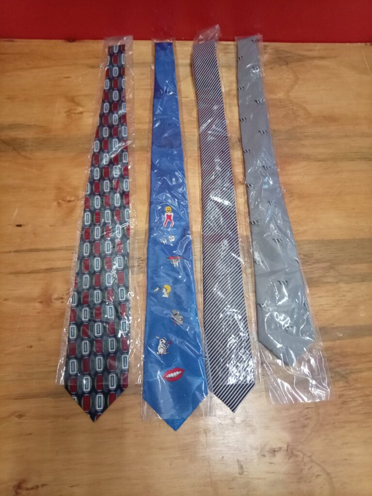 Lot of 4 Brand New Men’s Ties — Assorted Patterns, Sealed in Plastic