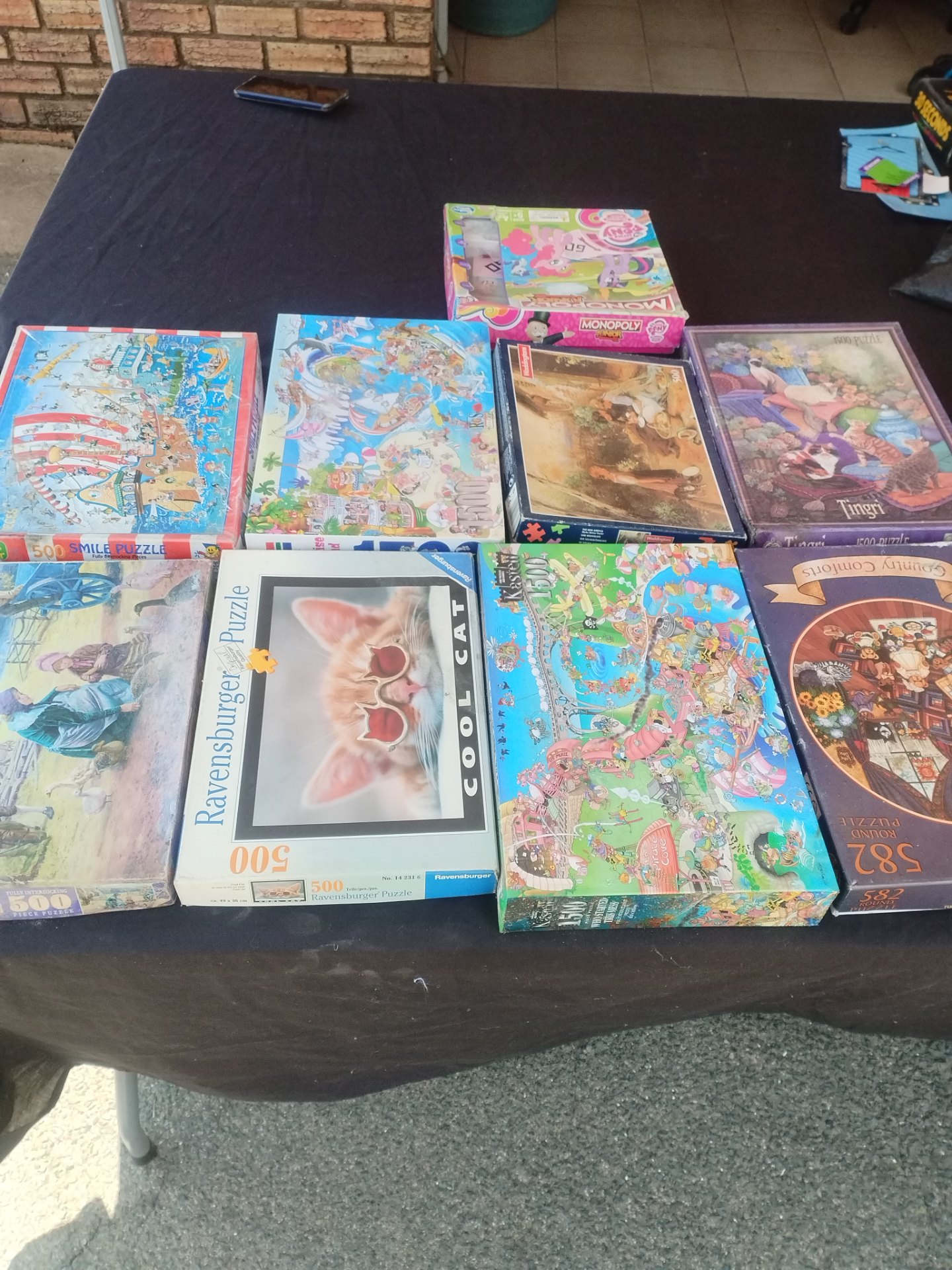 Mixed lot of boxed jigsaw puzzles + Monopoly Junior — assorted 150–1500pc (est. 10 boxes)