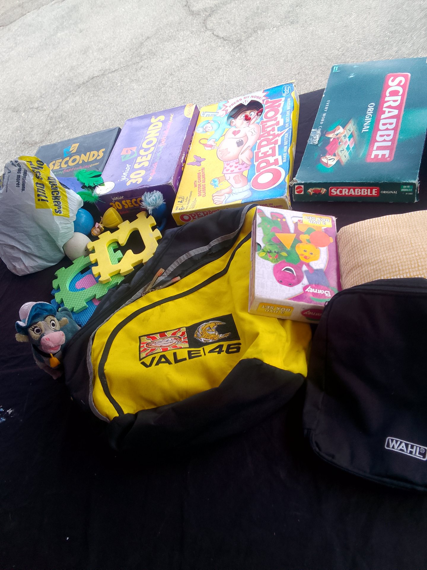 Mixed lot — Plush toys, boxed board games (Scrabble, Operation, 30 Seconds Junior), DVDs & kids items