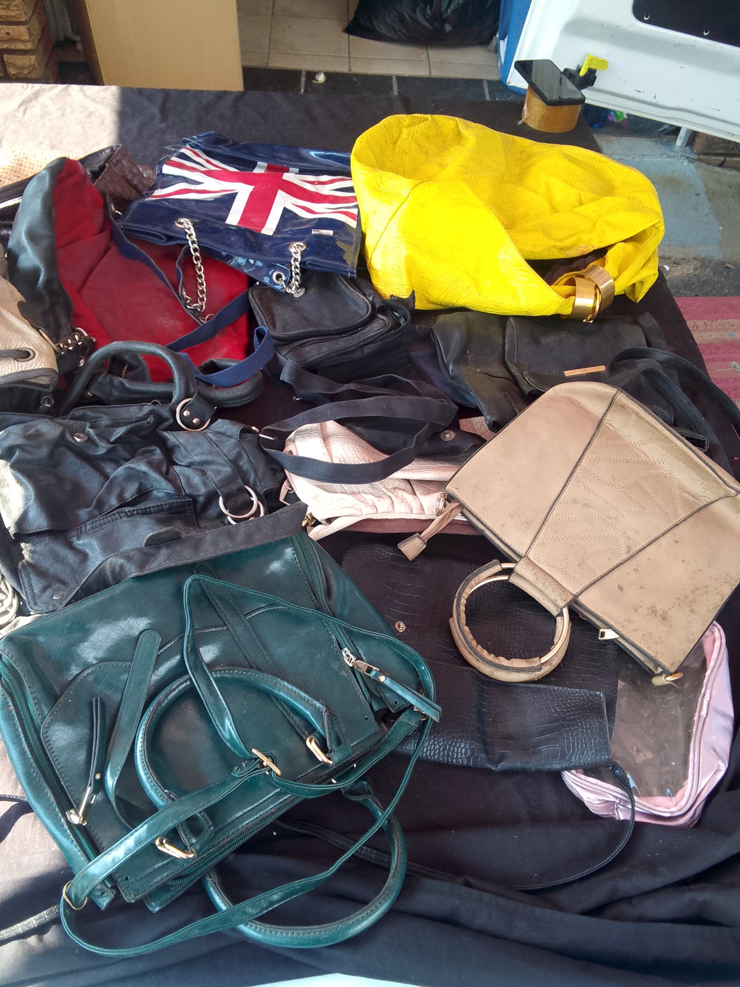 Mixed lot of women’s handbags & purses — approx. 10 pieces, used, mould/stains, some damaged components