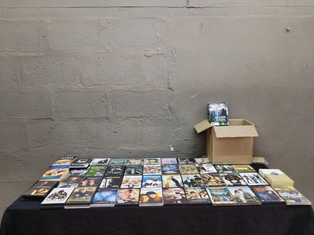 Mixed Lot of DVDs, CDs and a Few Paperback Books — approx. 45 items (box-set included)