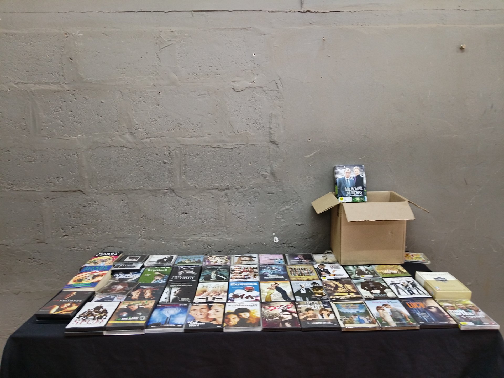 Mixed Lot of DVDs, CDs and a Few Paperback Books — approx. 45 items (box-set included)
