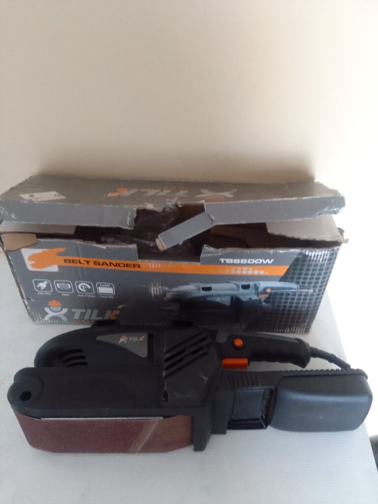 TILK TBS600W Belt Sander — working, sanding belt fitted, original box included (damaged)