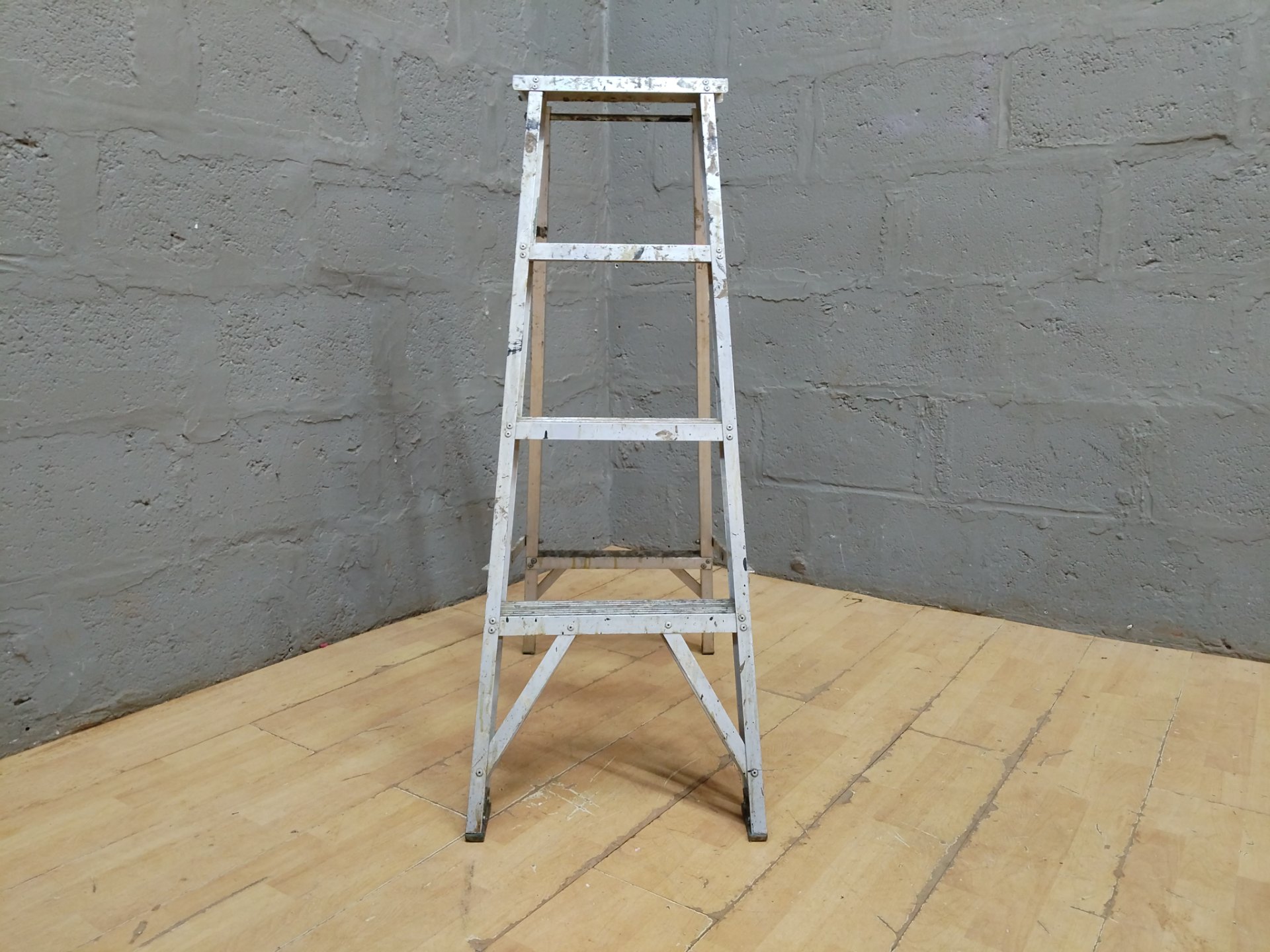 Used aluminium A-frame step ladder — paint-splattered, 3 steps + top platform (untested)