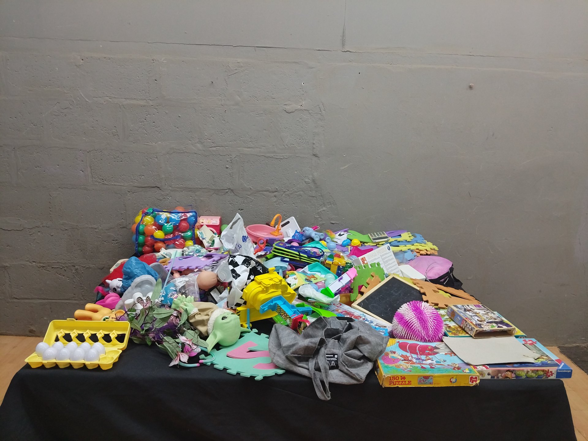 Bulk mixed children’s toys & puzzles lot — approx 150 pieces, used (Educa puzzle visible)