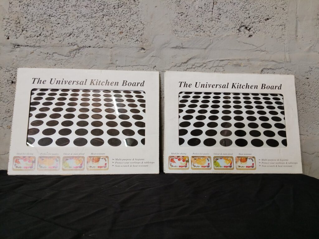 Lot of 2 The Universal Kitchen Board — boxed, polka-dot design (packaging worn)