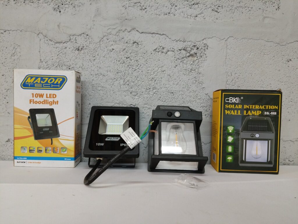 Mixed lot: Major Tech 10W LED Floodlight + CBK BK-888 Solar Interaction Wall Lamp — boxed, tested, screws included