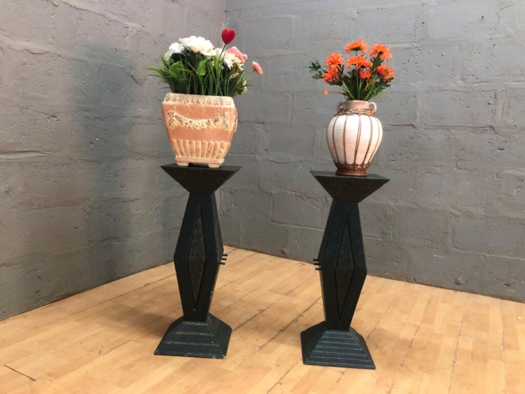 Pair of decorative wooden plant stands with two vases & artificial flower arrangements