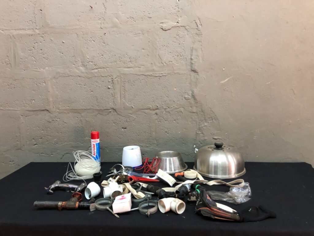 Mixed lot — plumbing fittings, clamps, small hand tools, stainless bowls, Aerolak aerosol & Callaway shoe (used)