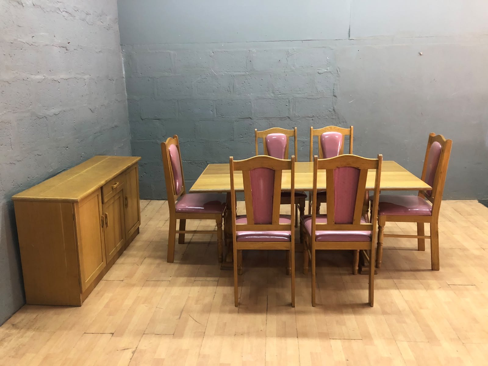 6‑Seat Dining Table Suite with Sideboard — Light wood finish, pink upholstered seats (Used)